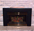 Regency U31 gas fireplace with black and gold louvres.
