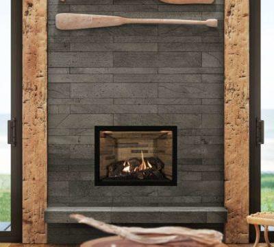 Ambiance Intrigue 36 direct vent gas fireplace with ledge stone panels and clean face finish.