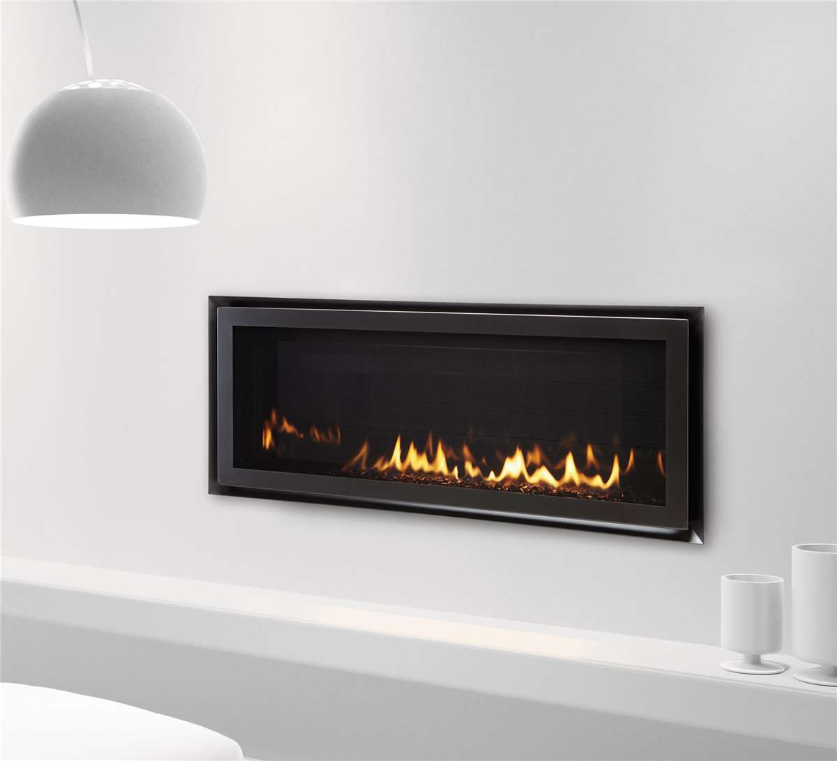 Cosmo 42 gas fireplace with Martini ebony front, black glass media, and glass liner.