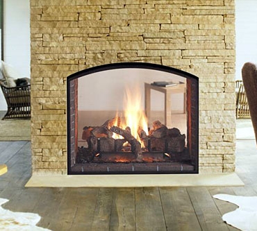 Heat-n-Glo Escape see-through direct vent gas fireplace with arched front and firescreen.