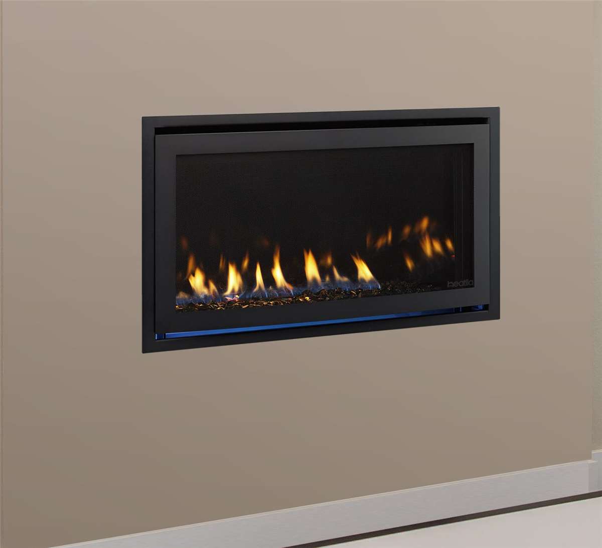 Heatilator Rave 32" direct vent gas fireplace with Illusion black front, reflective panels, and accent lights.