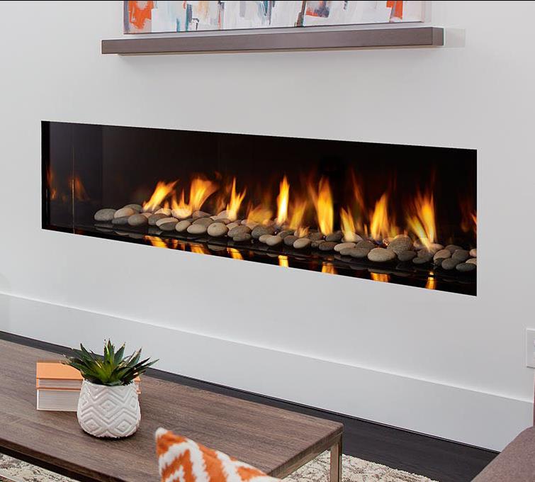 Regency New York View high-end gas fireplace, 72" model with volcanic stones and enamel black reflective panels.