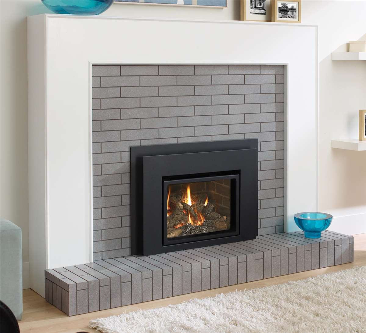 L234 with contemporary faceplate, along with optional brick panels and hearth riser.