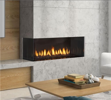 Regency Chicago Corner 40" direct vent gas fireplace with reflective panels and glass crystals in left side configuration.