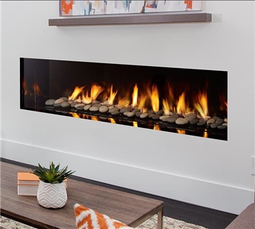 Regency New York View high-end gas fireplace, 72" model with volcanic stones and enamel black reflective panels.