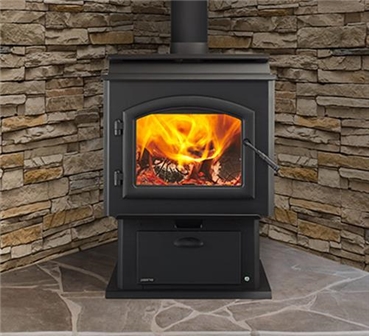 Adventure II wood stove shown with black arched door.