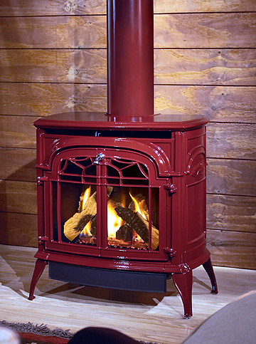 Vermont Castings Stardance direct vent gas stove in Bordeaux Red finish.