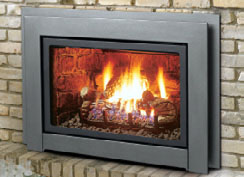 Capella IDV33LP direct vent propane fireplace insert shown with with split fiber oak log set, pewter clean view kit and surround, and refractory brick liner.