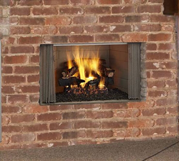 Villawood wood fireplace with surround materials finished to the edge.  Optional gas logs are also pictured.